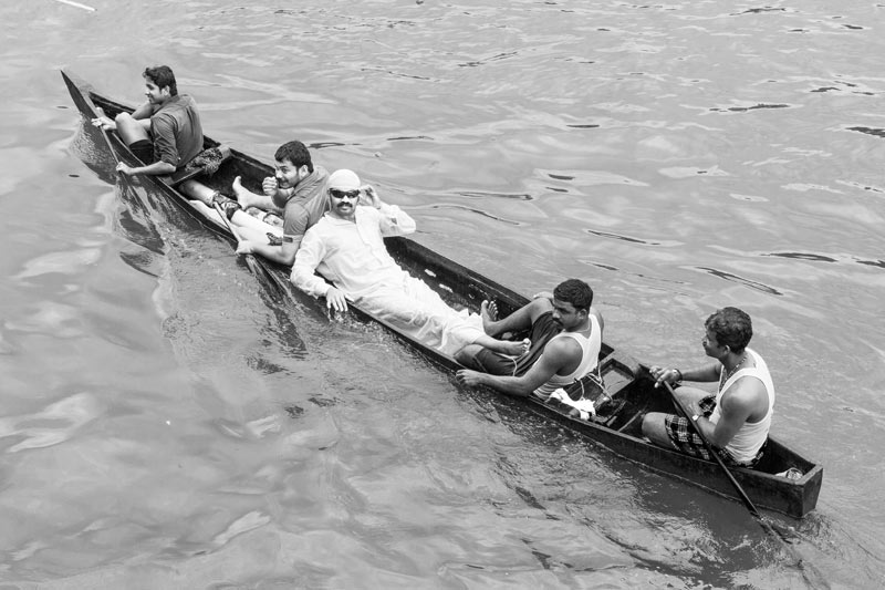 Water for Recreation and Enjoyment - youth enjoying a boat ride in Payippad river, district Alappuzha, Kerala